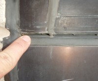 Sealant Failure - window glass - metal frame system